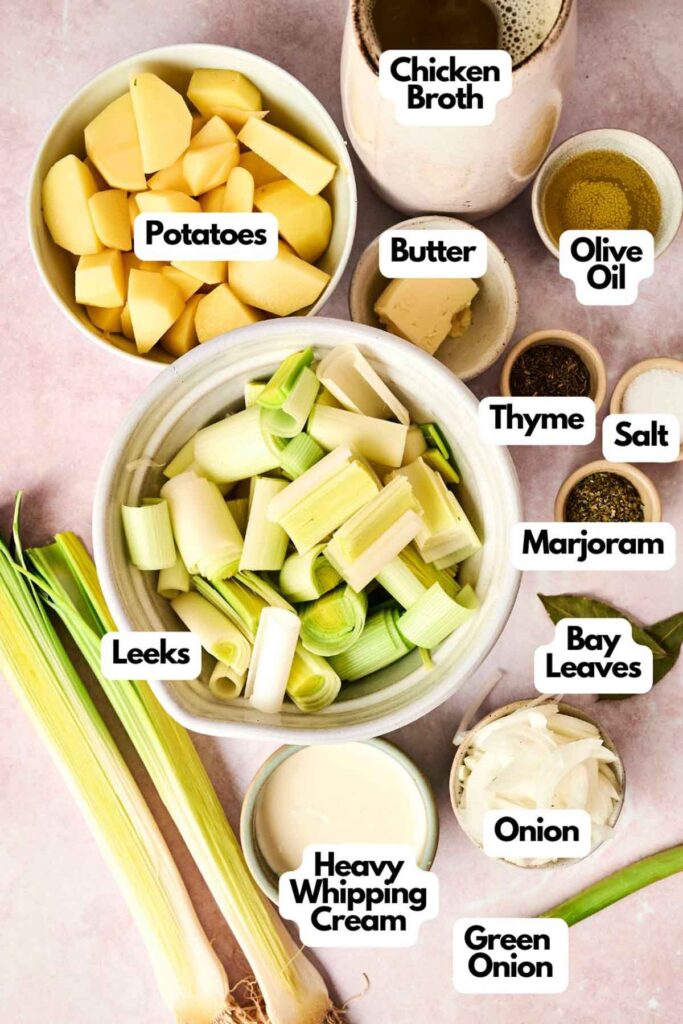 For a comforting leek and potato soup, gather chicken broth, potatoes, butter, olive oil, thyme, salt, marjoram, bay leaves, leeks, onion, heavy whipping cream, and green onion. Perfectly blended flavors make this classic soup irresistibly creamy and satisfying.