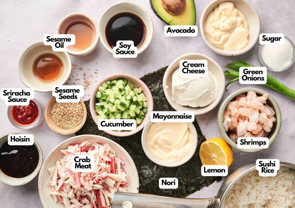 Ingredients for sushi bake: crab meat, shrimps, sushi rice, cucumber, nori, cream cheese, mayonnaise, avocado, lemon, green onions, soy sauce, sesame oil, sesame seeds, hoisin sauce, sriracha sauce, and sugar.