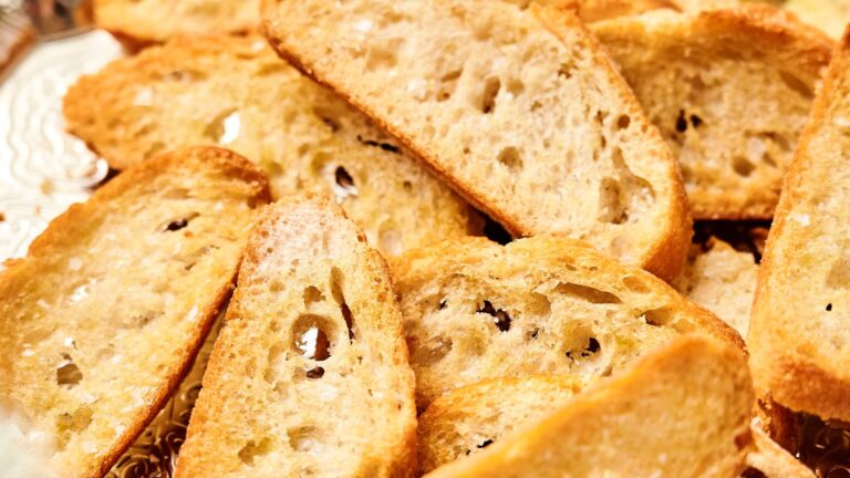 Slices of toasted bread arranged closely together.